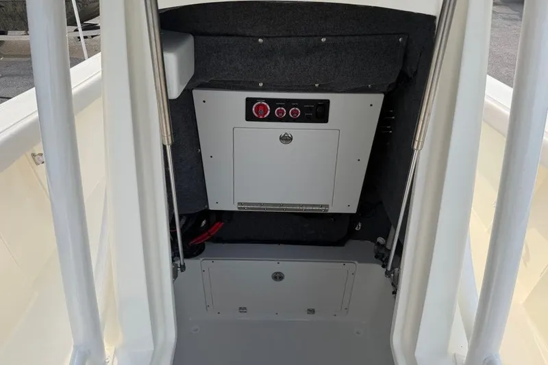 Slide: The Image of Interior view of 2026 Mako 226 Center Console boat's control panel. - 13