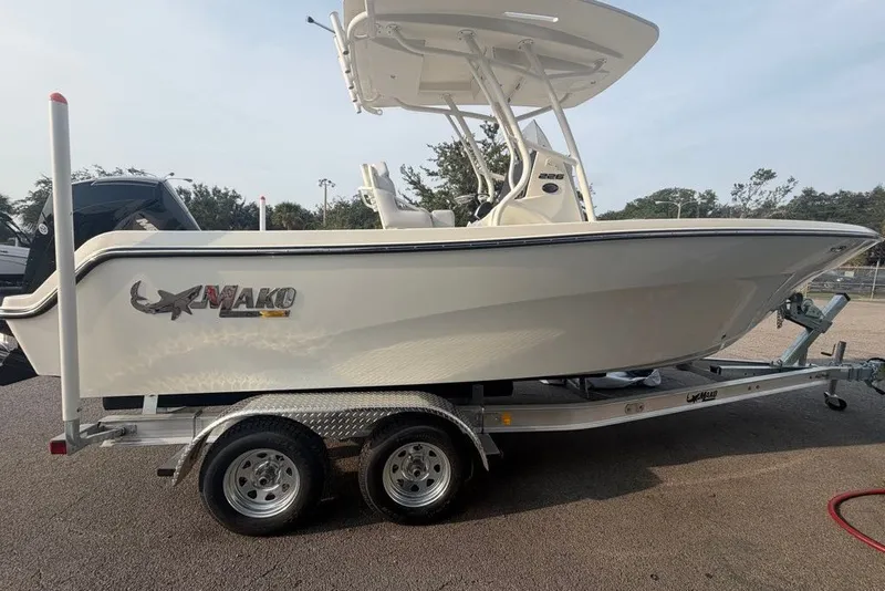 The Image of 2026 Mako 226 Center Console boat on trailer, side view. - 0