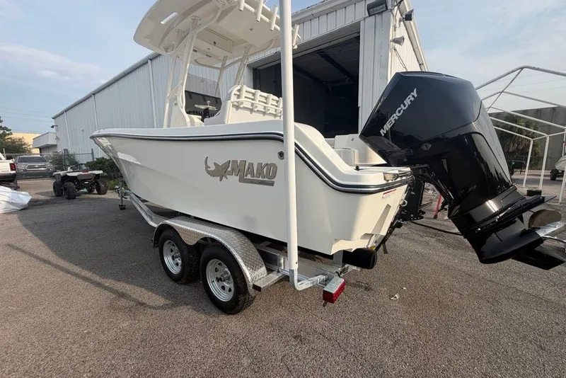Slide: The Image of 2026 Mako 226 Center Console boat with Mercury engine on trailer. - 16