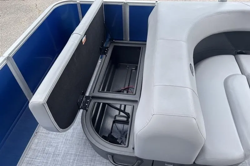 Slide: The Image of Interior storage compartment of 2026 Sun Tracker Party Barge 18 DLX pontoon boat. - 22