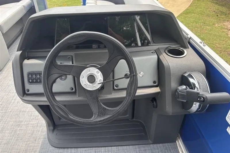Slide: The Image of Steering console of 2026 Sun Tracker Party Barge 18 DLX pontoon boat. - 17
