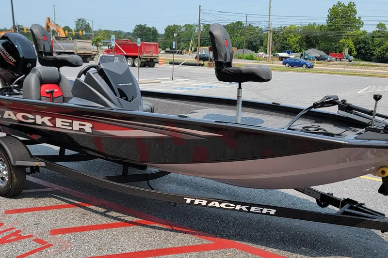 Slide: The Image of 2025 Tracker Pro Team 175 boat on trailer in parking lot. - 3