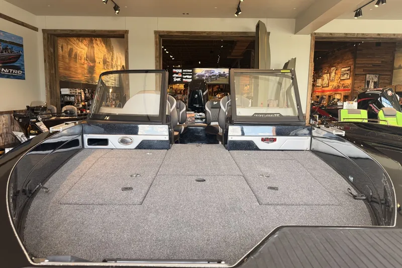 Slide: The Image of 2026 Ranger 621FS Cup-Equipped boat displayed in a showroom setting. - 8