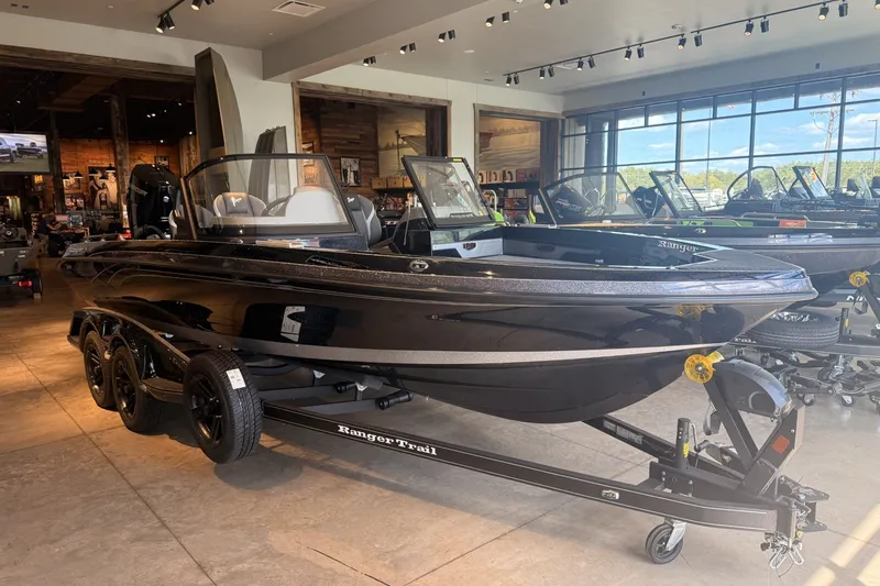 Slide: The Image of 2026 Ranger 621FS Cup-Equipped boat displayed in a showroom with modern interior. - 4