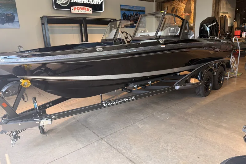 Slide: The Image of 2026 Ranger 621FS Cup-Equipped boat on trailer in showroom. - 2