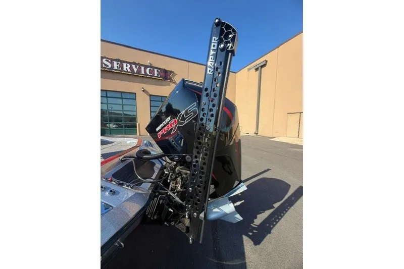 Slide: The Image of 2026 Ranger Z520R boat with Mercury Pro XS engine and Raptor mount in service area. - 7