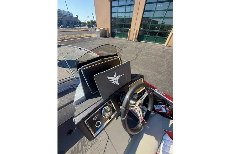 Slide: The Image of 2026 Ranger Z520R boat dashboard with steering wheel and electronic displays. - 9