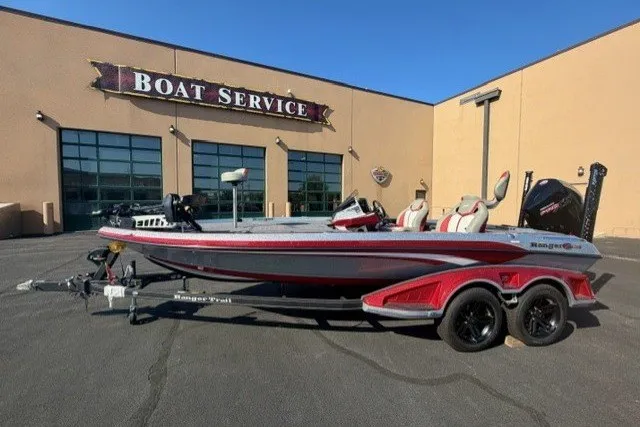 The Image of 2026 Ranger Z520R boat on trailer outside a boat service center. - 0