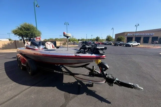 Slide: The Image of 2026 Ranger Z520R boat on trailer in parking lot, near service center. - 3