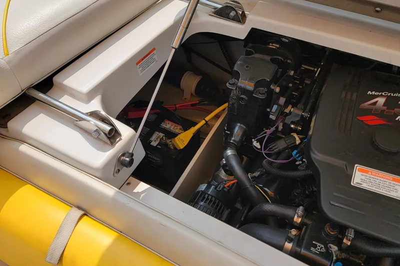 Slide: The Image of Engine compartment of a 2007 Crownline 19 SS boat, featuring a MerCruiser 4.3L engine. - 8