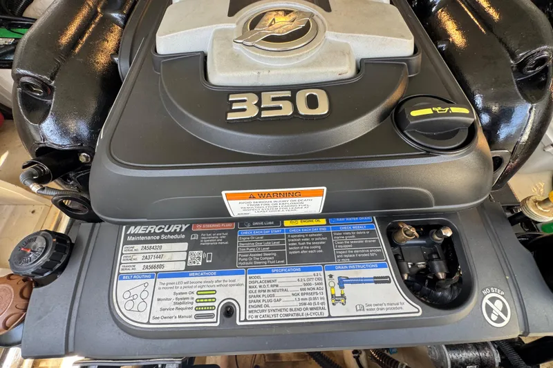 Slide: The Image of Engine compartment of a 2019 Formula 270 Bowrider with Mercury 350 engine specifications. - 50