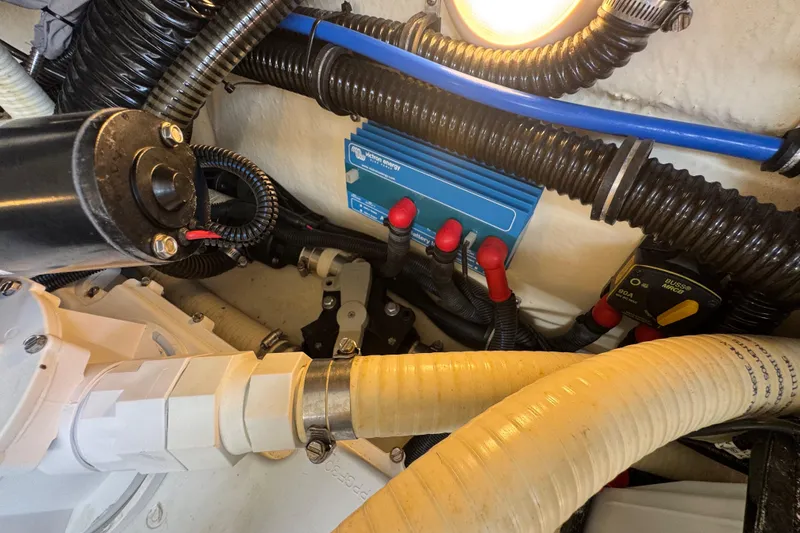 Slide: The Image of Engine compartment of a 2019 Formula 270 Bowrider with wiring and components. - 54