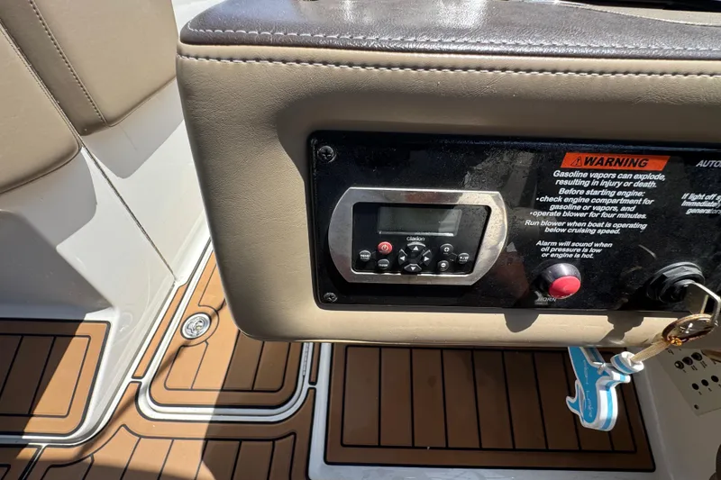 Slide: The Image of Control panel of a 2019 Formula 270 Bowrider boat with warning label. - 36