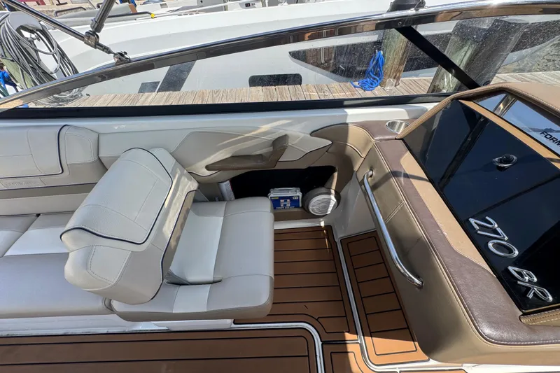 Slide: The Image of 2019 Formula 270 Bowrider interior with luxurious seating and sleek design. - 24