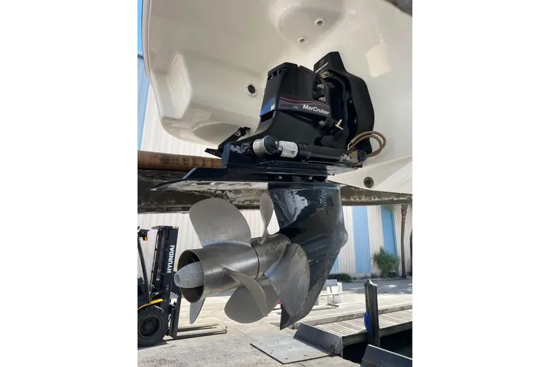 Slide: The Image of 2019 Formula 270 Bowrider boat with MerCruiser engine and propeller, dockside view. - 9