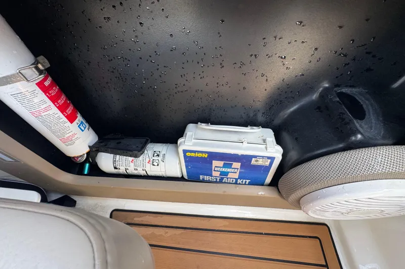 Slide: The Image of Safety equipment on a 2019 Formula 270 Bowrider, including fire extinguishers and a first aid kit. - 28