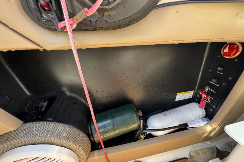 Slide: The Image of Interior view of a 2019 Formula 270 Bowrider boat showing equipment and controls. - 39