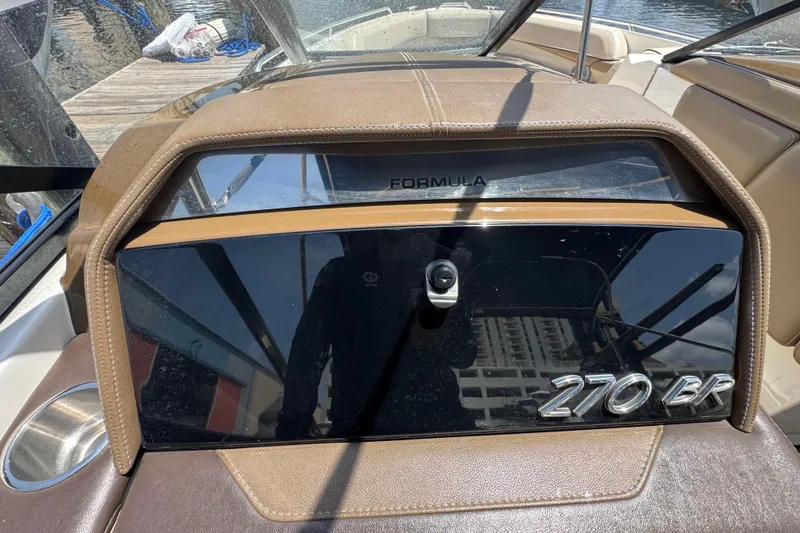 Slide: The Image of 2019 Formula 270 Bowrider dashboard with sleek design and branding details. - 25
