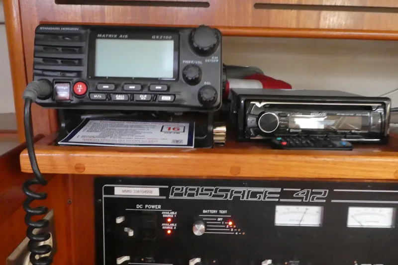 Slide: The Image of Radio and control panel inside a 1992 Hunter Passage 42 sailboat cabin. - 20