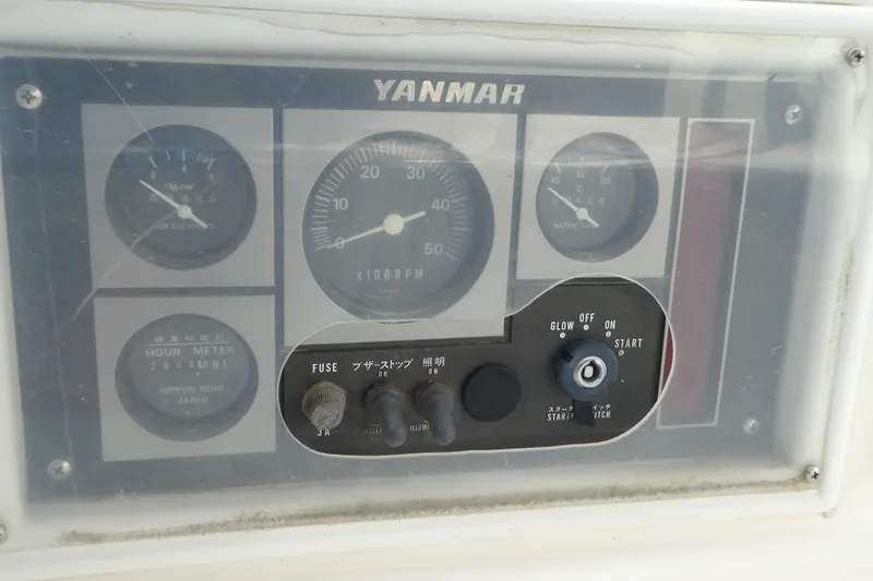 Slide: The Image of Control panel of a 1992 Hunter Passage 42 sailboat with Yanmar engine gauges. - 11