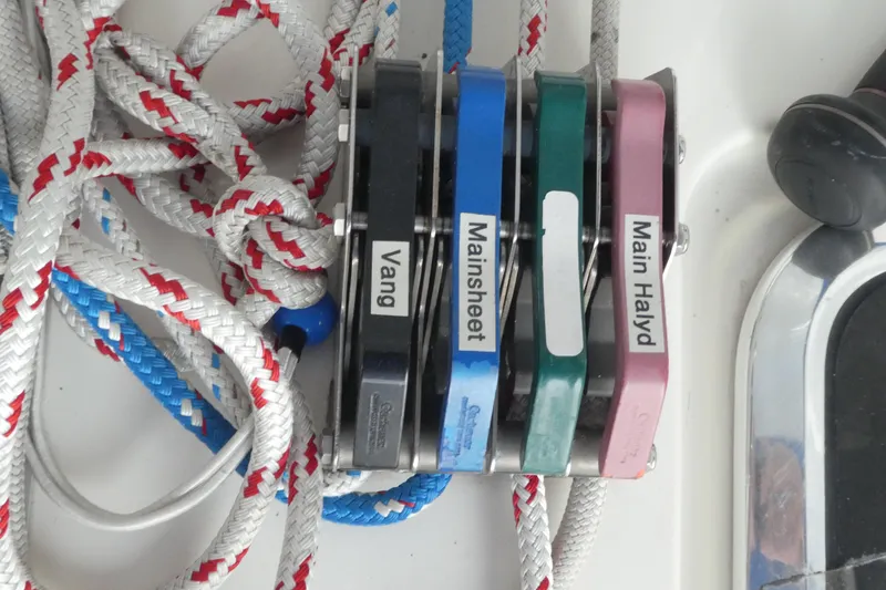 Slide: The Image of Sailing ropes and labeled clutches on a 1992 Hunter Passage 42 yacht. - 9
