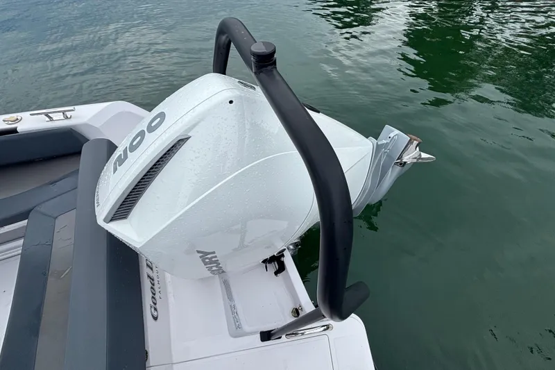 Slide: The Image of 2022 Axopar 22 T-Top boat with Mercury outboard engine on calm water. - 18