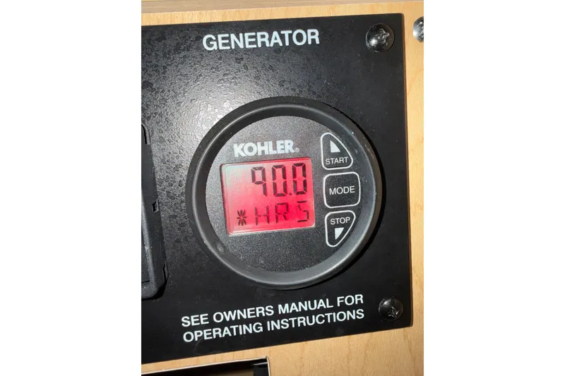 Slide: The Image of Kohler generator display showing 90 hours on a 2008 Sea Ray Sundancer 330. - 19