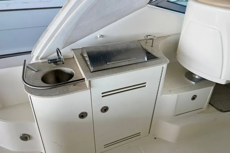 Slide: The Image of 2008 Sea Ray Sundancer 330 yacht interior with sink and grill station. - 7