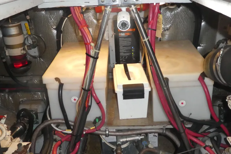 Slide: The Image of Engine room of a 1997 Silverton 41 Convertible with batteries and wiring. - 26