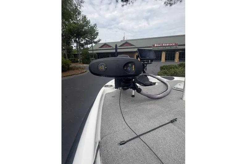Slide: The Image of 2012 Bass Cat Cougar FTD boat with trolling motor at service center. - 15