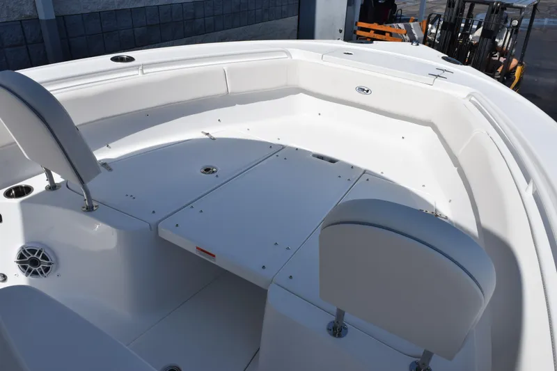 Slide: The Image of 2027 Sea Hunt Ultra 255 SE boat interior with spacious seating and modern design. - 11