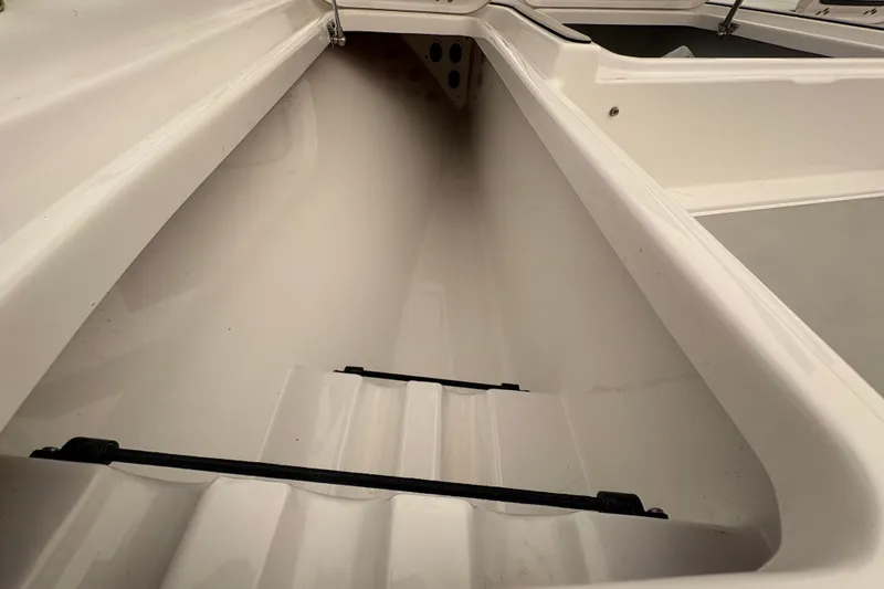 Slide: The Image of Storage compartment of 2023 Sportsman Masters 227 Bay Boat, showcasing interior design. - 12