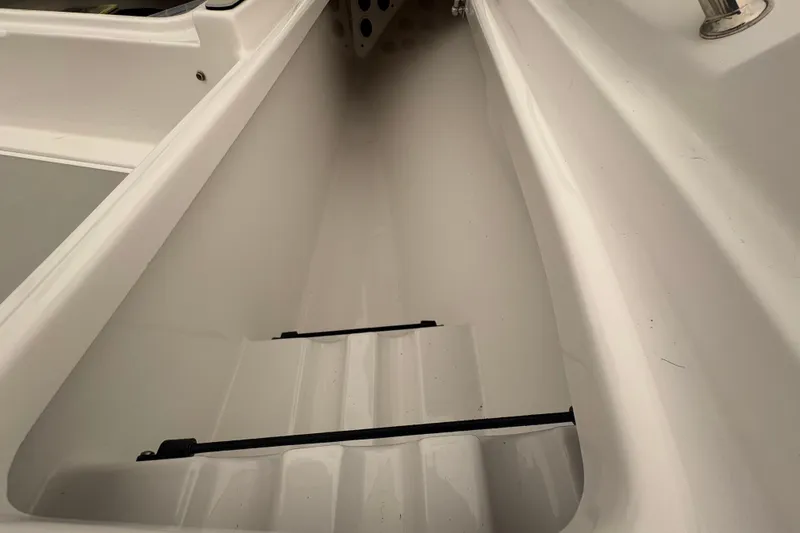 Slide: The Image of 2023 Sportsman Masters 227 Bay Boat interior storage compartment, showcasing sleek design and functionality. - 13