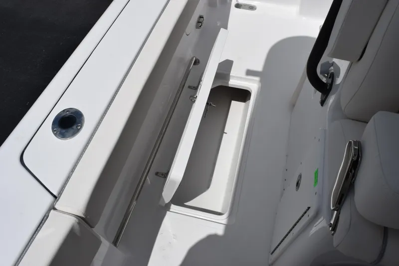 Slide: The Image of 2027 Sea Hunt Ultra 275 SE boat interior storage compartment detail. - 20