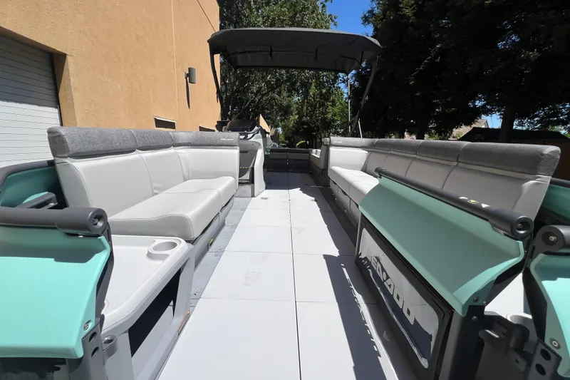 Slide: The Image of 2026 Sea-Doo Switch Cruise 21 pontoon boat with spacious seating and modern design. - 8