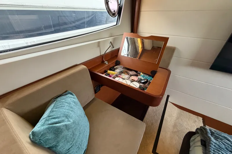 Slide: The Image of Luxurious interior of 2012 Prestige 500S yacht with vanity and seating area. - 55