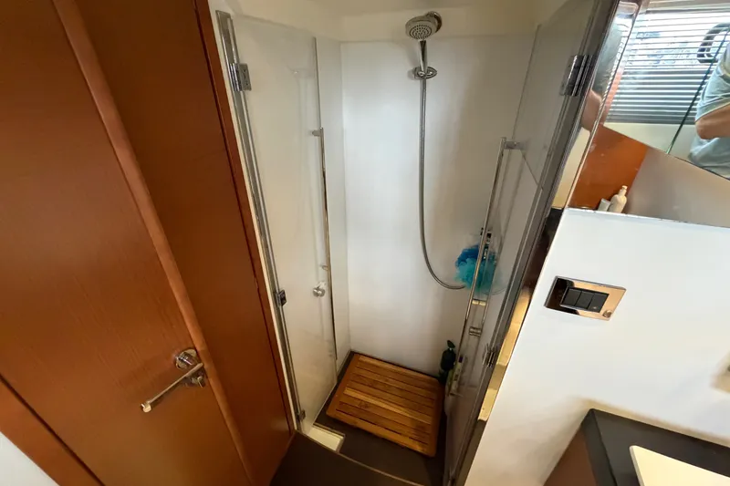 Slide: The Image of Compact shower area in a 2012 Prestige 500S yacht bathroom. - 61