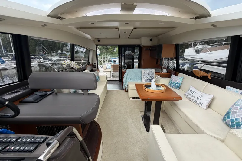 Slide: The Image of Luxurious interior of a 2012 Prestige 500S yacht with elegant seating and decor. - 43