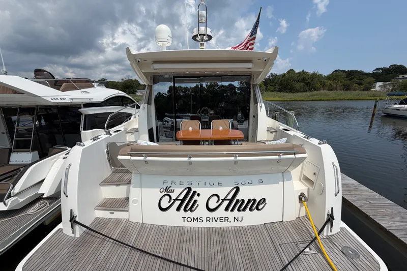 Slide: The Image of Luxury 2012 Prestige 500S yacht docked, featuring "Miss Ali Anne" from Toms River, NJ. - 4