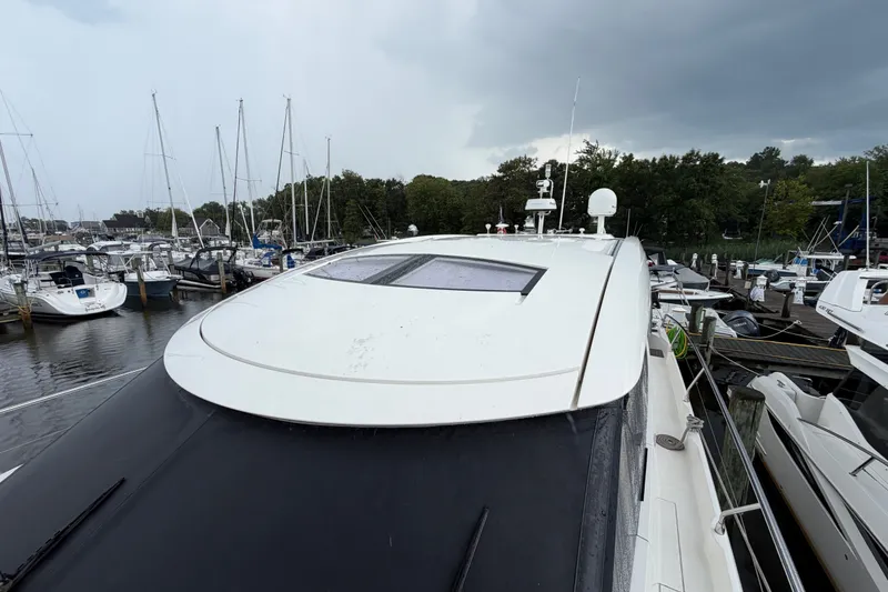 Slide: The Image of Prestige 500S 2012 yacht docked at marina under cloudy sky. - 90
