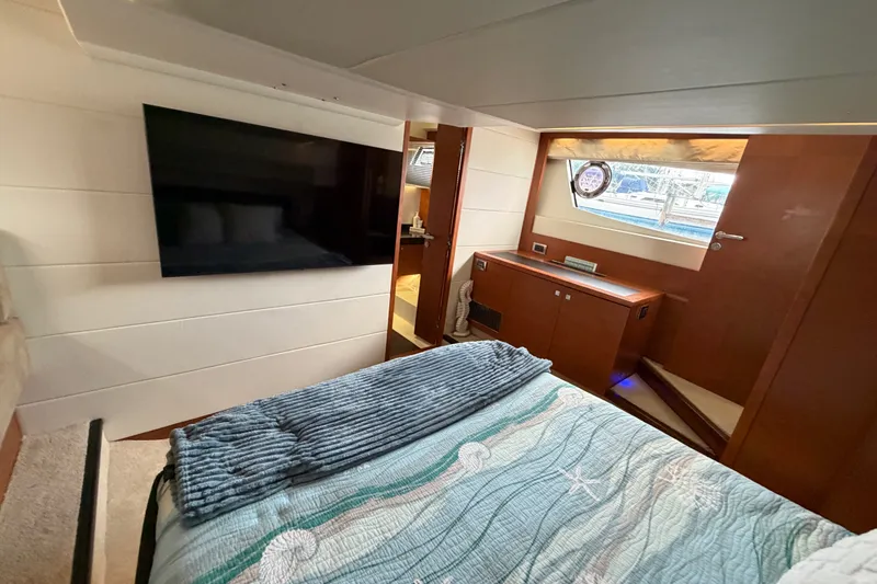 Slide: The Image of Luxurious cabin interior of 2012 Prestige 500S yacht with modern amenities and stylish decor. - 57