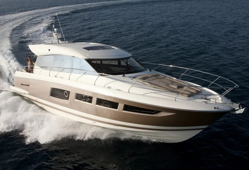 Slide: The Image of Manufacturer Provided Image: 2013 Prestige 500 S yacht cruising on open water. - 2