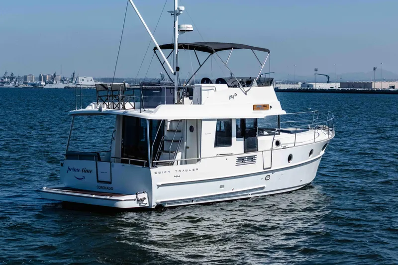 The Image of 2019 Beneteau Swift Trawler 44 cruising on open water. - 0