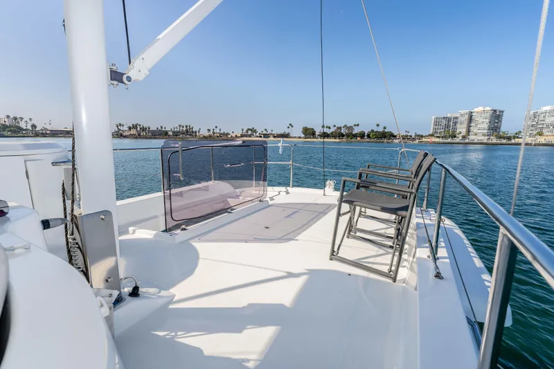 Slide: The Image of Flybridge of 2019 Beneteau Swift Trawler 44 with ocean view and seating area. - 9