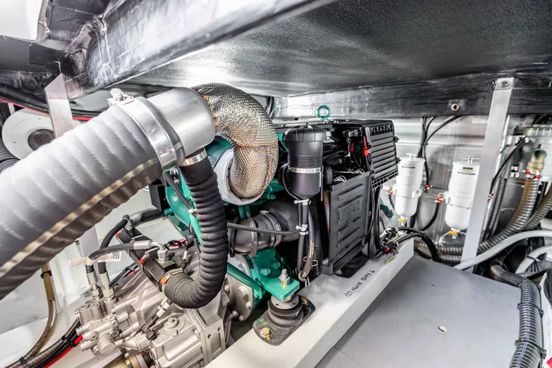 Slide: The Image of Engine room of 2019 Beneteau Swift Trawler 44, showcasing mechanical components and systems. - 32