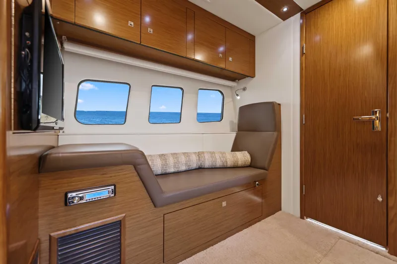Slide: The Image of Luxurious interior of 2016 Cruisers Yachts 45 Cantius with ocean view windows. - 55