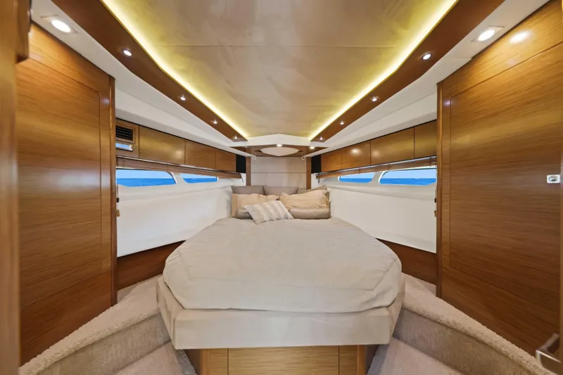Slide: The Image of Luxurious interior cabin of 2016 Cruisers Yachts 45 Cantius with elegant wood finishes. - 45