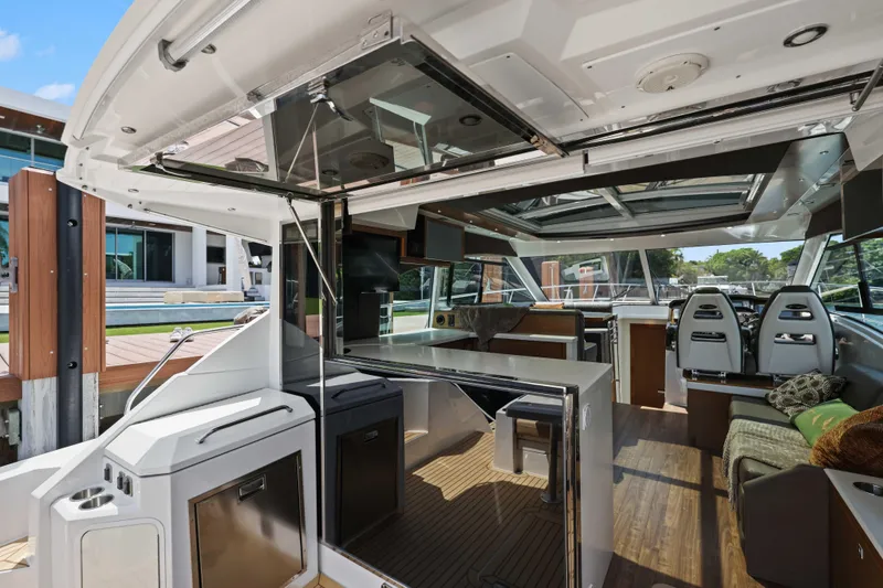 Slide: The Image of Interior view of 2016 Cruisers Yachts 45 Cantius, featuring modern design and spacious seating. - 30