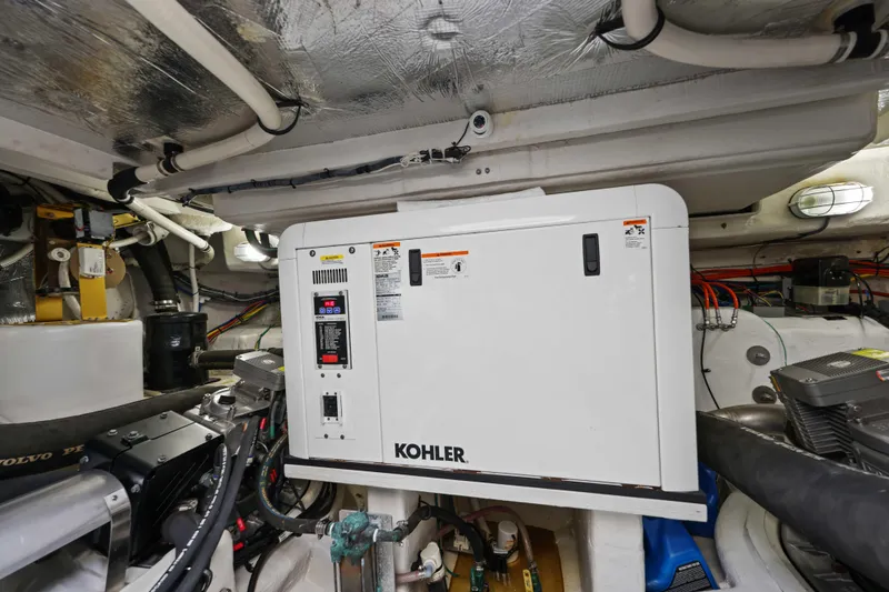 Slide: The Image of Engine room of 2016 Cruisers Yachts 45 Cantius with Kohler generator. - 63