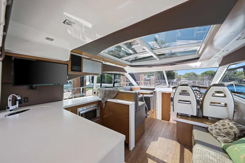 Slide: The Image of Luxurious interior of 2016 Cruisers Yachts 45 Cantius with modern amenities and panoramic windows. - 34